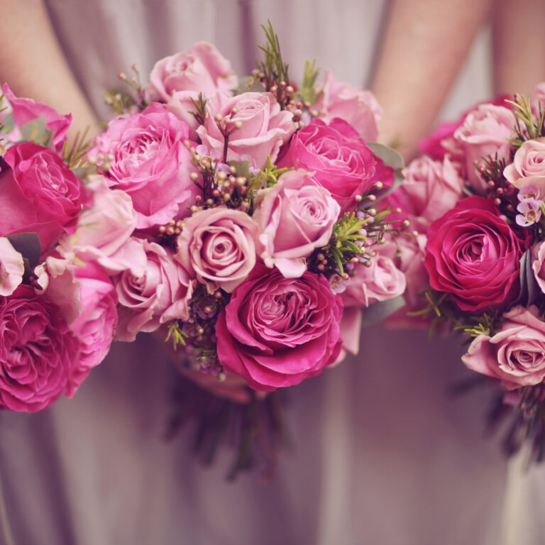 Trio of pink bridesmaid posies and roses