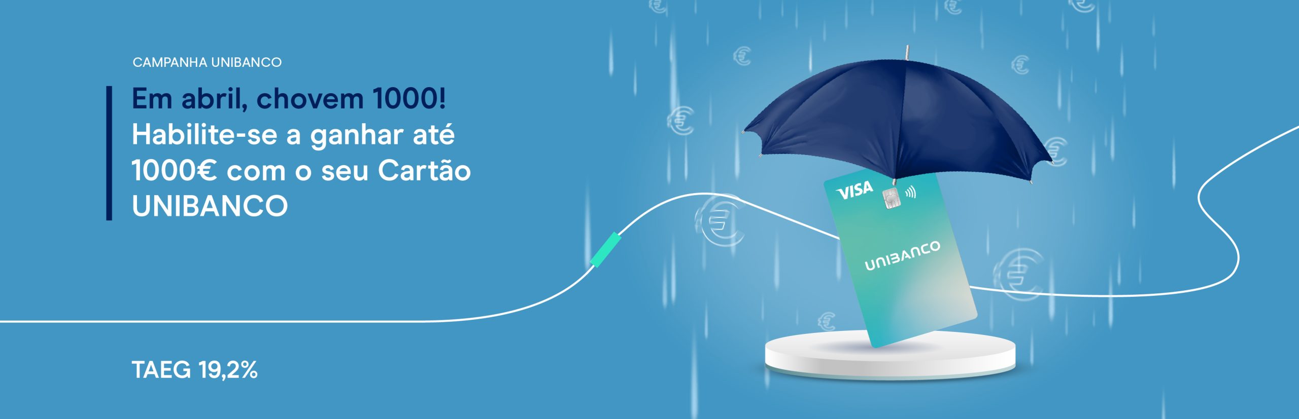 Guarda chuvas a tapar um cartão de crédito unibanco a ilustrar a campanha de Abril