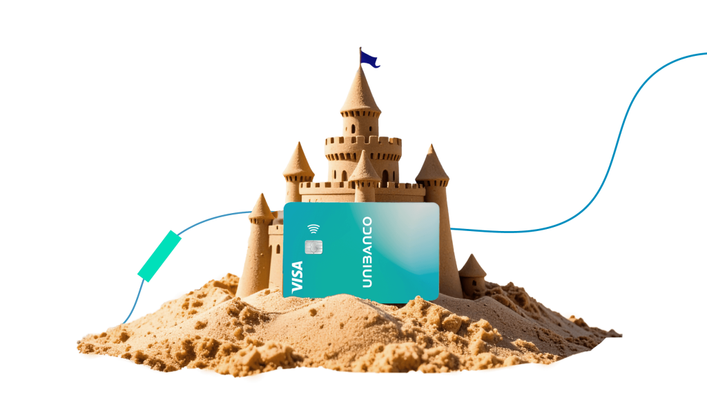 Castelo de areia com cartão de crédito da campanha de verão unibanco 2025